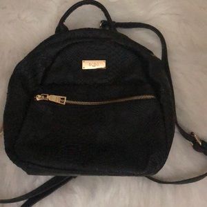 BCBG snakeskin backpack